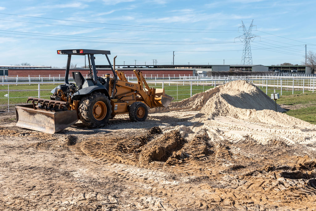 Newly adjusted footing at 4Hearts Ranch indoor arena features a professional mix incorporating some lighter, fluffier asphalt sand